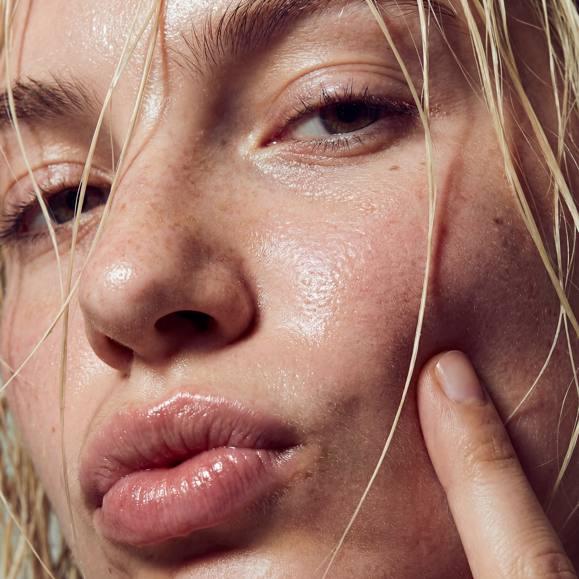 Client with radiant, glowing skin after a personalized facial treatment at Skin Reset NYC